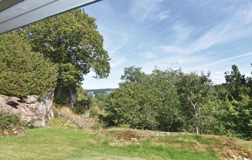 a view of a hill with trees on it at 2 Bedroom Stunning Home In Prässebo in Eckerud