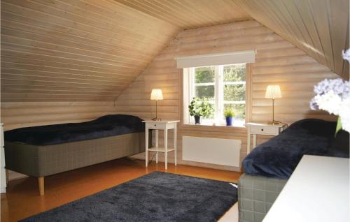 Postel nebo postele na pokoji v ubytování Beautiful Home In Lckeby With House Sea View