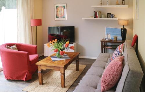Χώρος καθιστικού στο One-Bedroom Apartment In Graal-Muritz