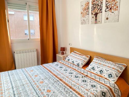 Postel nebo postele na pokoji v ubytování Lloret Fenals Apartment Antilles