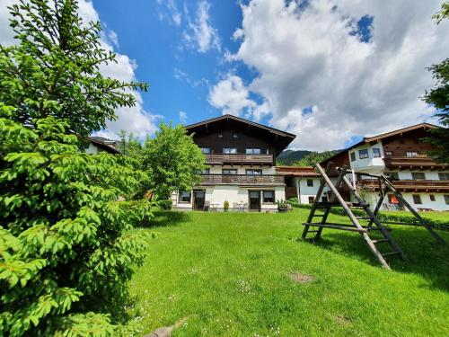 Vonkajšia záhrada v ubytovaní Profelt`s Apartments Uttendorf - Steinbock Lodges