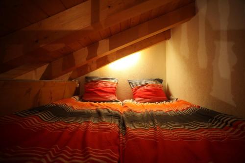Tempat tidur dalam kamar di Alphome Flums