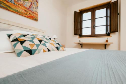 Ένα ή περισσότερα κρεβάτια σε δωμάτιο στο iSlow Coliving