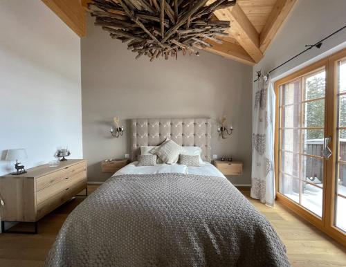 Ένα ή περισσότερα κρεβάτια σε δωμάτιο στο Central holiday flat Scalottas Lenzerheide