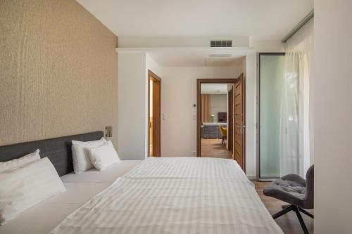 Posteľ alebo postele v izbe v ubytovaní Spa Residence Carbona Onyx Deluxe Apartman