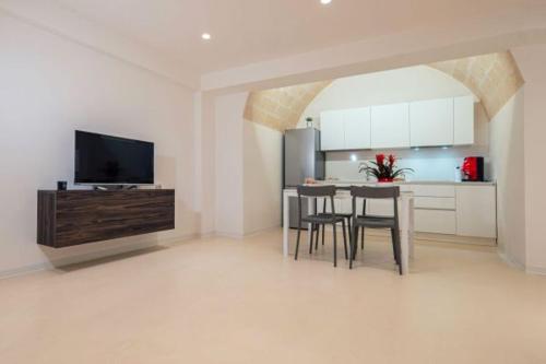 TV a/nebo společenská místnost v ubytování I Lamioni - Suite & accommodation