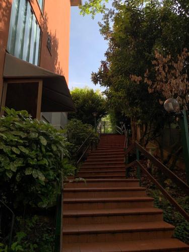 a set of stairs leading up to a building at Amica in Salsomaggiore Terme