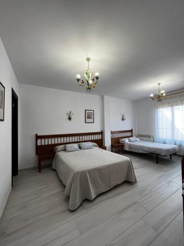Postel nebo postele na pokoji v ubytování El Palaero