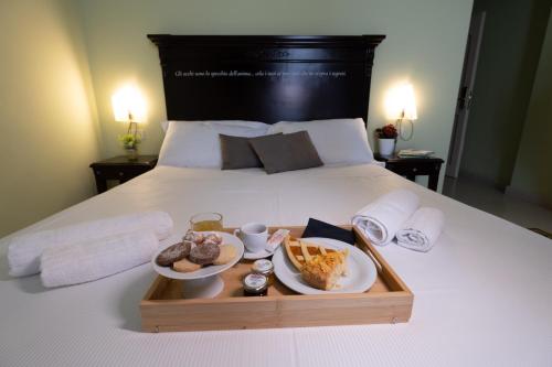 Hotel Borgo di Ciàulaにあるベッド