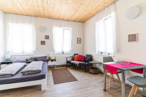 Postel nebo postele na pokoji v ubytování TAGBLATT Apartment 1