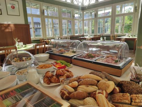 a table with many different types of food on it at Gutshof Andres in Kirchlauter