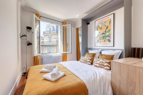Posteľ alebo postele v izbe v ubytovaní The Perfect 1bd Flat - Heart of Paris Les Halles
