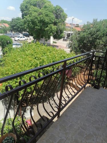 a black metal railing on a balcony at Apartments Vedrana in Ražanj