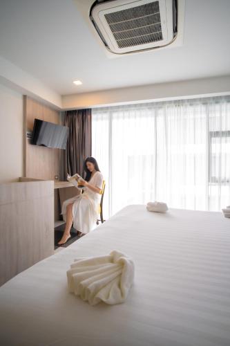 เตียงในห้องที่ กระบี่ซีบาส โฮเทล