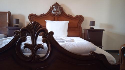 Ένα ή περισσότερα κρεβάτια σε δωμάτιο στο HiStory INN Unique Guest House