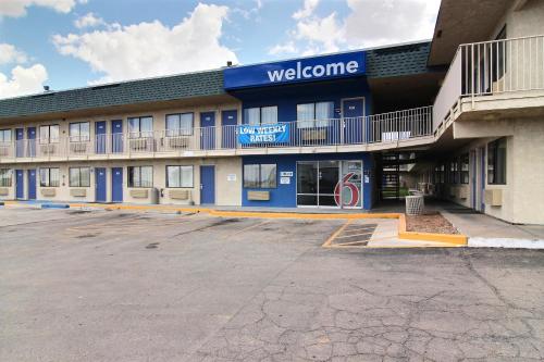 a welcome sign on the side of a building at Motel 6-Fort Stockton, TX in Fort Stockton