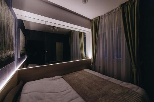 Postel nebo postele na pokoji v ubytování Urban Lux Apartmani