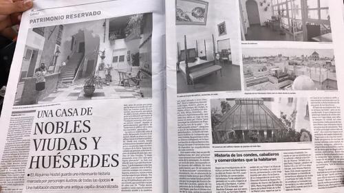 a newspaper page with a article in a house at Hotel Alquimia Cadiz in Cádiz