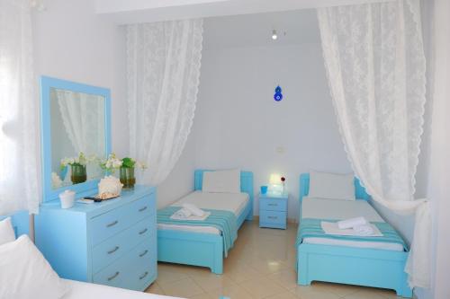 Hotel Two Mermaids Ksamilにあるベッド