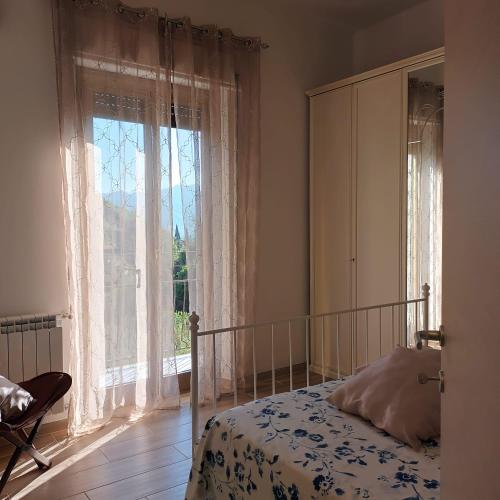 Ένα ή περισσότερα κρεβάτια σε δωμάτιο στο IL LIMONE