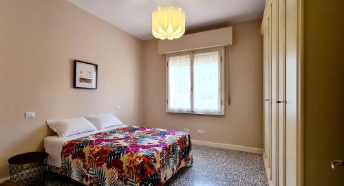 Ein Bett oder Betten in einem Zimmer der Unterkunft Appartamento in Piazza Nova