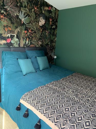 Ένα ή περισσότερα κρεβάτια σε δωμάτιο στο Adorable guest house au calme à 3 min du port