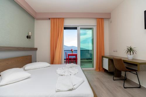 Postel nebo postele na pokoji v ubytování Hotel Picasso