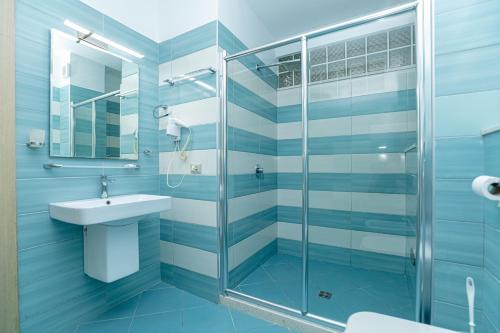 Koupelna v ubytování Hotel Picasso