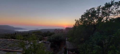 a view of a sunset from a hill at Elgina Apartments2 MANI in Mína