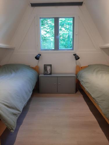 Postel nebo postele na pokoji v ubytování Cabin Life Durbuy