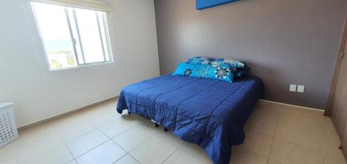 Katil atau katil-katil dalam bilik di Loft 10 min from Oro &Holy Beach, Marina, Galerias