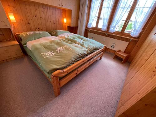 Postel nebo postele na pokoji v ubytování Apartment Résidence Sonnegg - Reimers - Vogel