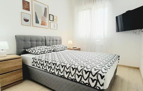 Ένα ή περισσότερα κρεβάτια σε δωμάτιο στο Apartman Kod Ane