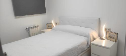 Ein Bett oder Betten in einem Zimmer der Unterkunft MUY CENTRICO LA PLAZA