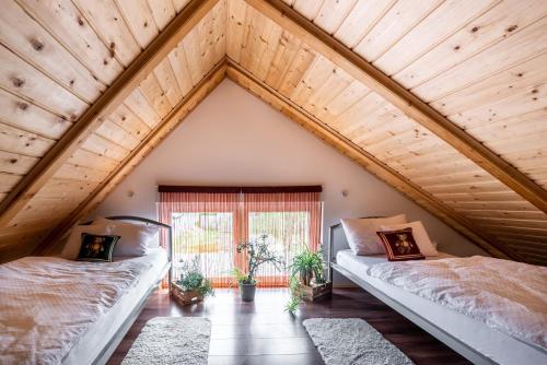 Posteľ alebo postele v izbe v ubytovaní Apartman Tea