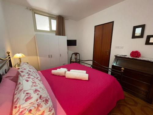 Posteľ alebo postele v izbe v ubytovaní Casa Rosy