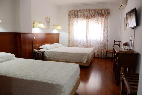 Cama o camas de una habitación en Estalagem Sequeira