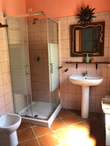 a bathroom with a shower and a sink at Amalfatah in Teulada