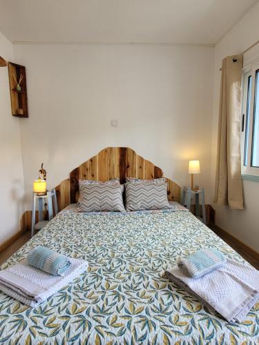 Ένα ή περισσότερα κρεβάτια σε δωμάτιο στο The Handmade House Azores