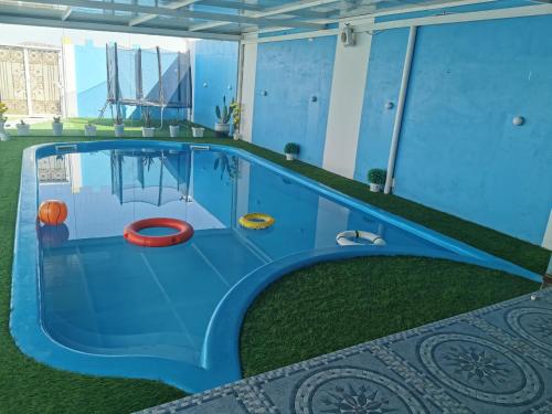 an indoor trampoline at Fig House Villa with Heated Swimming Pool & Firepit in Al ‘Aqar