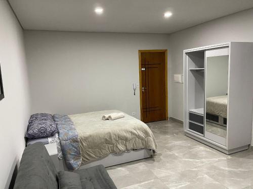 Cama o camas en una habitación en New Studio Apartment a pocos pasos de Paraguay - Villa Portes