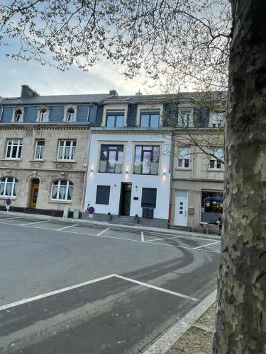 a large building on the side of a street at Guesthaus 2 in Dudelange