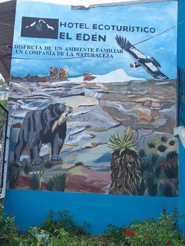 a sign for the hotel eclectico elenaena with a bear on it at Cabana hotel eco turistico el EDEN in Güicán