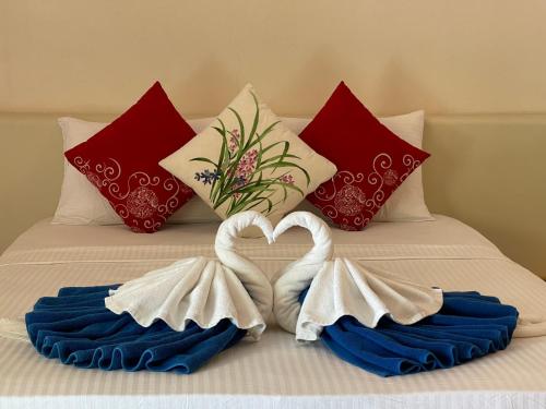 Łóżko lub łóżka w pokoju w obiekcie Thoddoo Retreat Grand