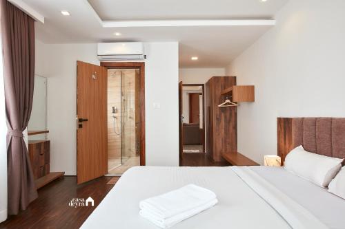 Cama o camas de una habitación en FIBO Residence By Casa Deyra