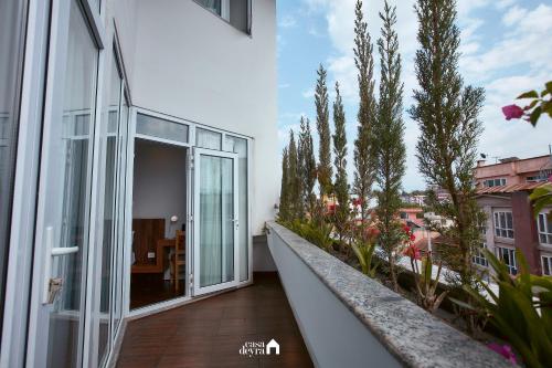 Un balcón o terraza de FIBO Residence By Casa Deyra