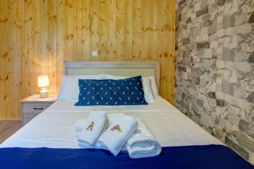 Posteľ alebo postele v izbe v ubytovaní Terezina wood house