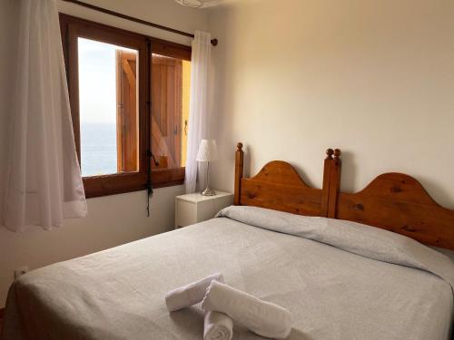 Postel nebo postele na pokoji v ubytování Wonderful Apartment with Outstanding Views - Calella de Palfrugell