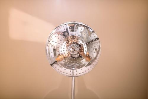 a silver cloche is shown on a table at B&B Casa del Vicario in Fagagna