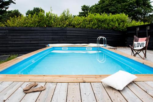 Bazén v ubytování Luxe vakantiehuis Nova met zwembad nebo v jeho okolí